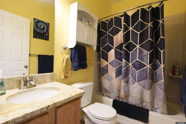 full bath featuring toilet, vanity, and shower / bath combo