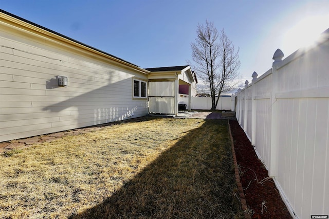 view of yard featuring a fenced backyard