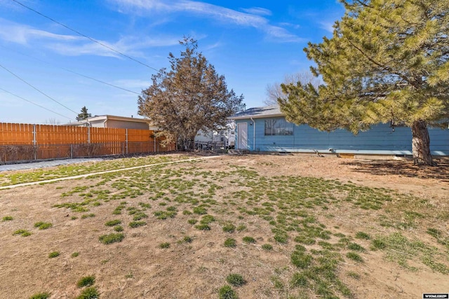 view of yard with fence