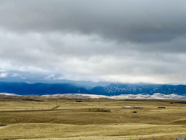 mountain view featuring a rural view