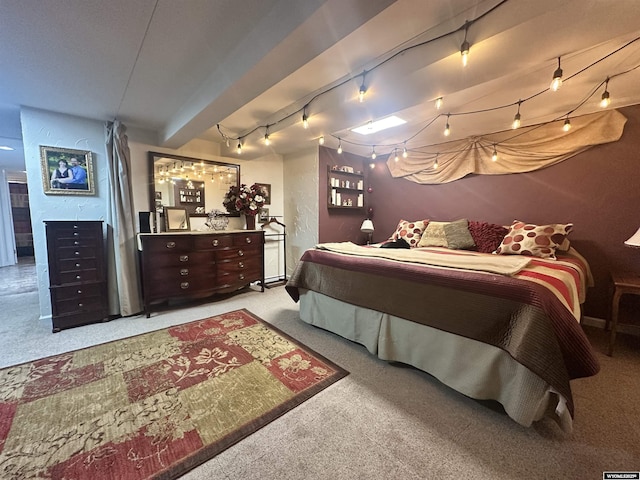 bedroom featuring carpet flooring and rail lighting