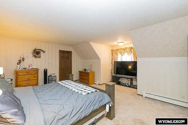 bedroom featuring light colored carpet and a baseboard radiator