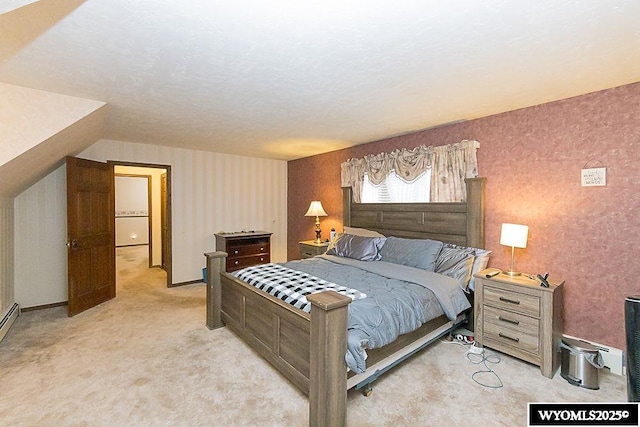 bedroom with wallpapered walls, baseboards, and light carpet