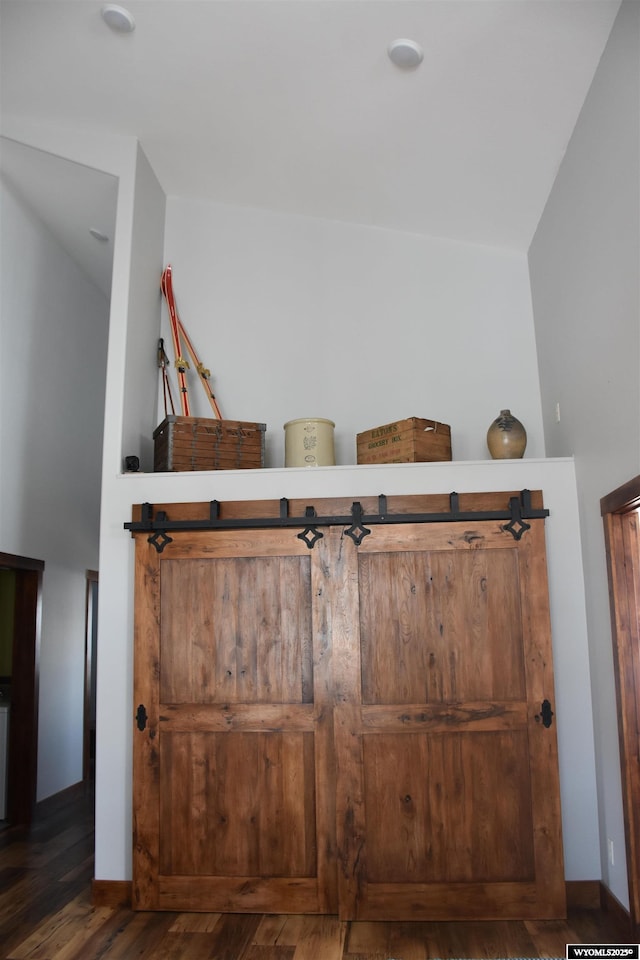 interior details with wood finished floors and baseboards