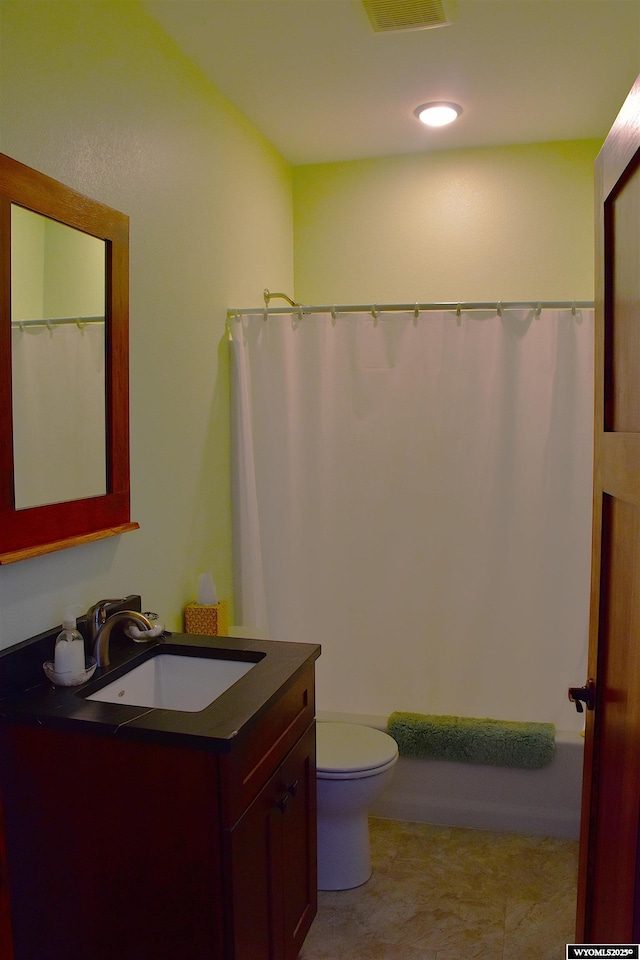 full bathroom with vanity, toilet, recessed lighting, and shower / bath combo with shower curtain