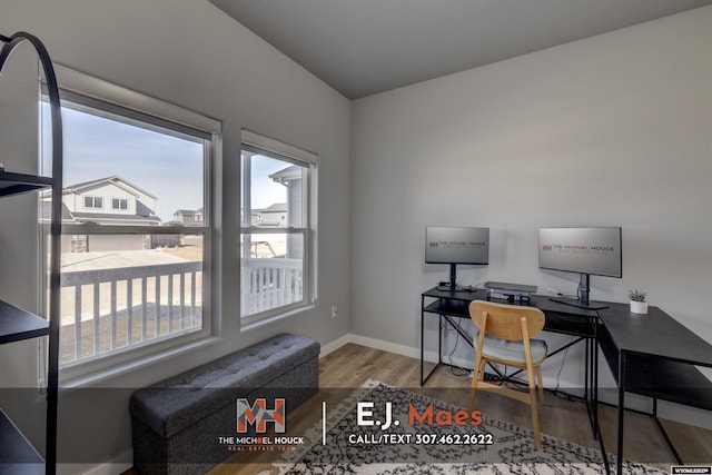 office with baseboards and wood finished floors