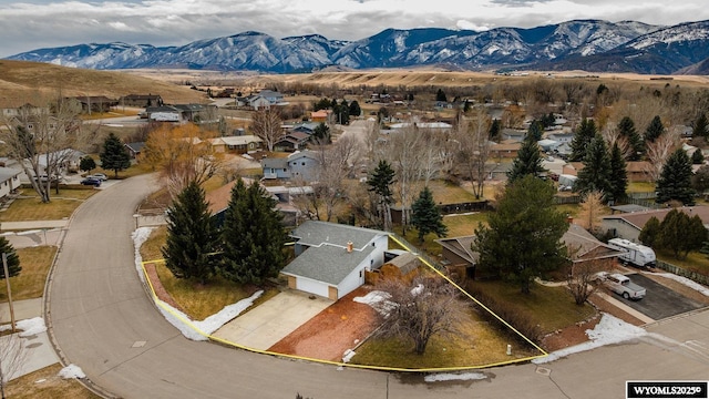 drone / aerial view with a mountain view and a residential view