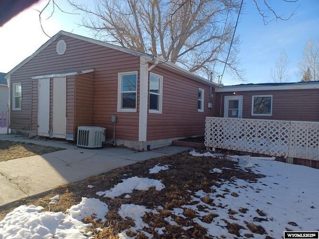 1711 Elk Ave, Casper, WY 82601 - snow covered property with central AC