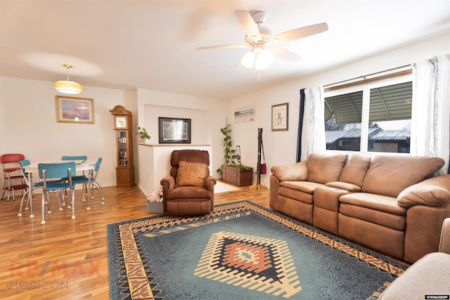 1242 Frontier Dr, Douglas, WY 82633 - living area featuring light wood-style flooring, baseboards, and ceiling fan