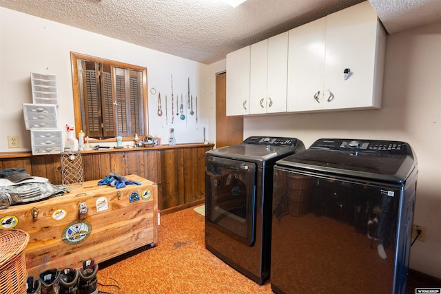 1242 Frontier Dr, Douglas, WY 82633 - laundry area with cabinet space, separate washer and dryer, wainscoting, and a textured ceiling