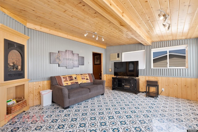 1242 Frontier Dr, Douglas, WY 82633 - living area featuring wooden ceiling, beamed ceiling, track lighting, and wainscoting