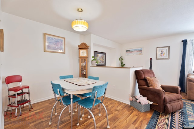1242 Frontier Dr, Douglas, WY 82633 - dining area featuring wood finished floors and baseboards