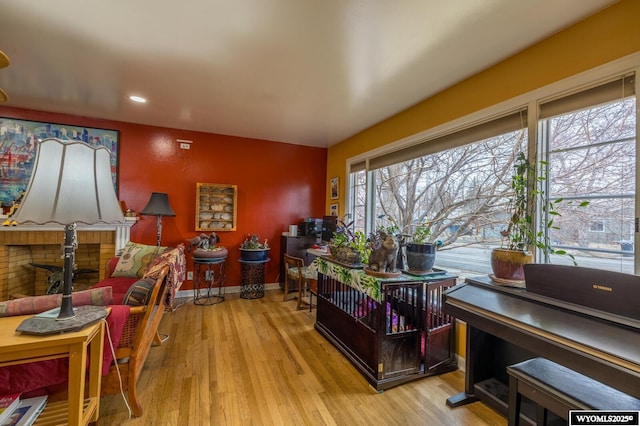 office with recessed lighting, baseboards, and wood finished floors