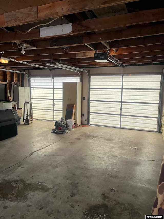 garage featuring a garage door opener
