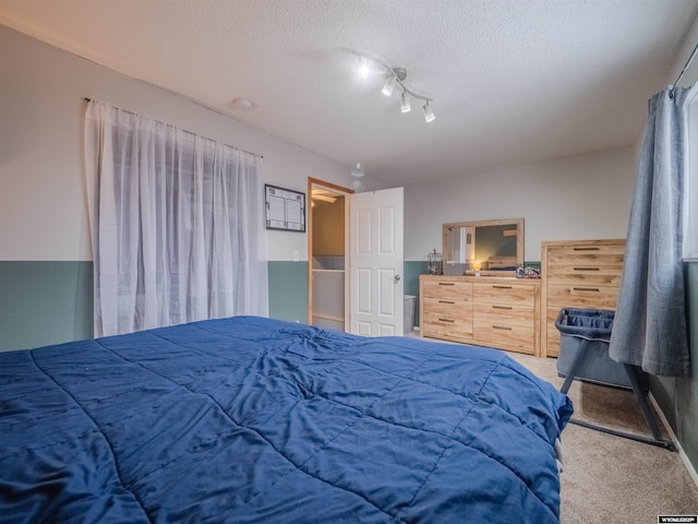 347 Copper, Evansville, WY 82636 - carpeted bedroom featuring a textured ceiling