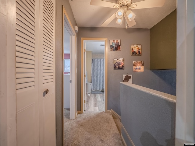 347 Copper, Evansville, WY 82636 - hall featuring baseboards, an upstairs landing, and carpet floors