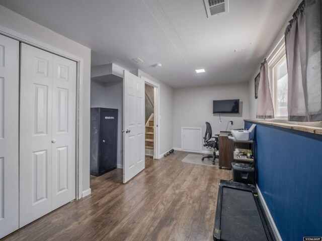 347 Copper, Evansville, WY 82636 - home office featuring visible vents, baseboards, and wood finished floors