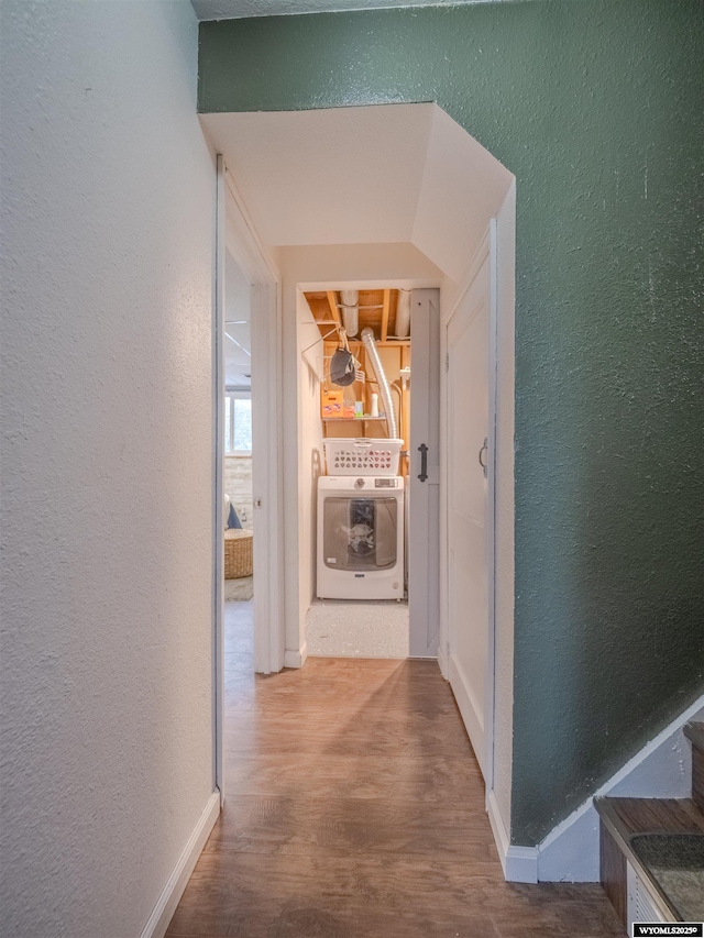 347 Copper, Evansville, WY 82636 - corridor featuring baseboards, washer / dryer, wood finished floors, and a textured wall