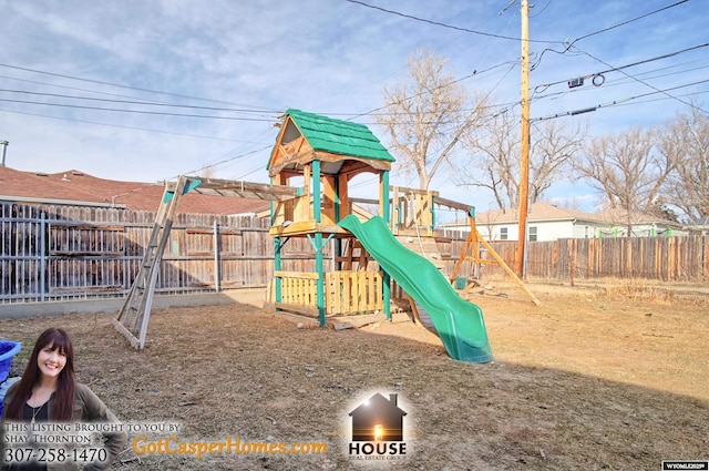 view of play area with a fenced backyard