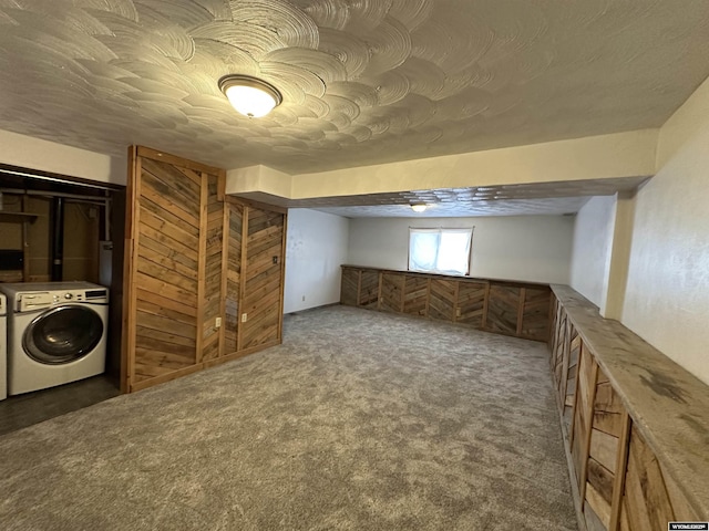 3649 Campbell Dr, Torrington, WY 82240 - below grade area featuring carpet floors, washer and clothes dryer, and a textured ceiling
