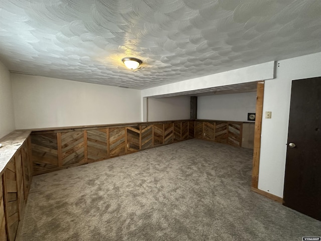 3649 Campbell Dr, Torrington, WY 82240 - finished below grade area featuring carpet flooring and a textured ceiling