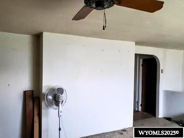 175 3rd Ave, Lusk, WY 82225 - details with arched walkways and ceiling fan