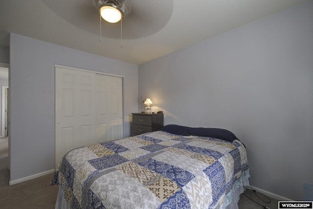 bedroom with ceiling fan, baseboards, carpet flooring, and a closet