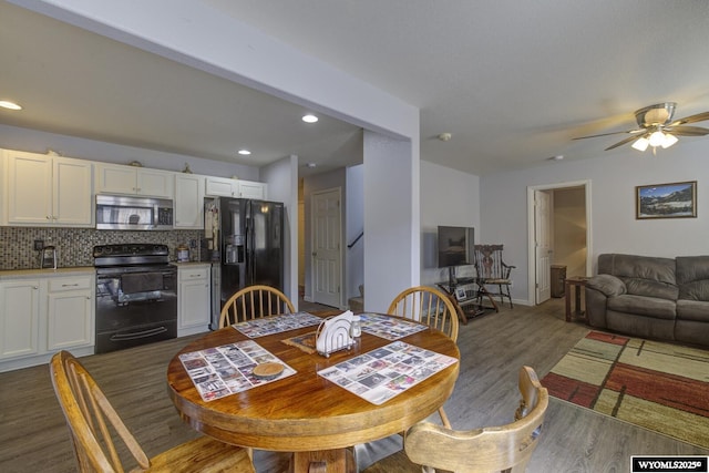dining area featuring recessed lighting, wood finished floors, and a ceiling fan