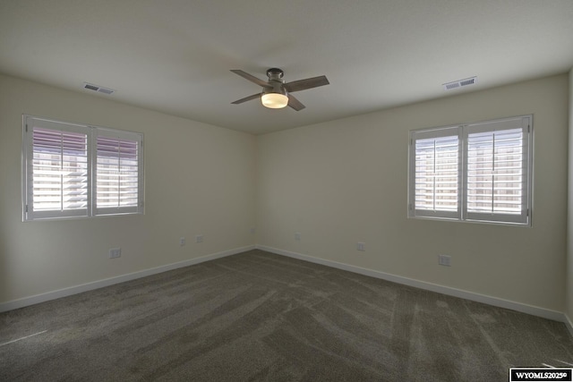 2087 Basswood St, Casper, WY 82604 - empty room featuring carpet floors, baseboards, ceiling fan, and visible vents