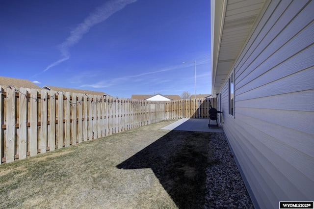 2087 Basswood St, Casper, WY 82604 - view of yard with a fenced backyard and a patio area