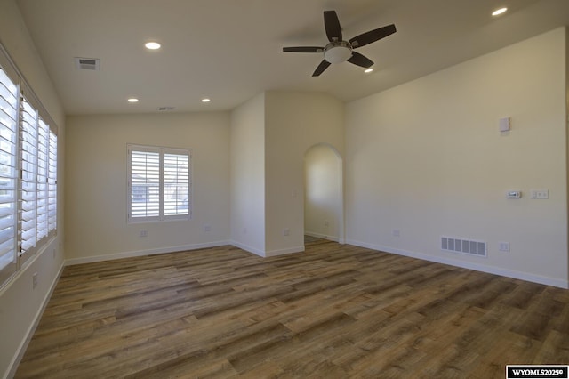 2087 Basswood St, Casper, WY 82604 - unfurnished room featuring ceiling fan, arched walkways, vaulted ceiling, and visible vents