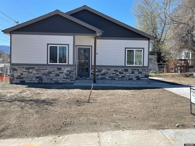 view of front of home with stone siding