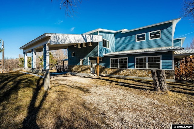 94 Upper Clear Creek Rd, Buffalo, WY 82834 - back of property featuring a yard and metal roof