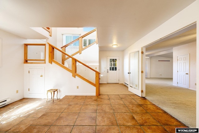 94 Upper Clear Creek Rd, Buffalo, WY 82834 - tiled foyer featuring baseboards, stairway, and carpet flooring