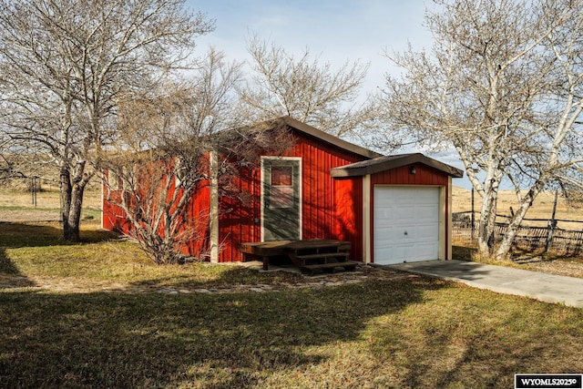 exterior space with driveway and a garage