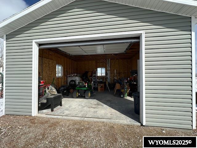garage featuring driveway