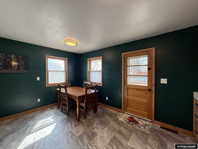 655 Amoretti St, Lander, WY 82520 - dining area with plenty of natural light and baseboards