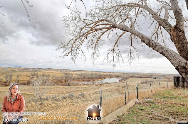 1244 Riverbend Dr, Douglas, WY 82633 - exterior space with fence and a rural view
