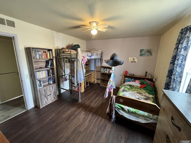2842 Main St, Torrington, WY 82240 - bedroom featuring ceiling fan, visible vents, and wood finished floors