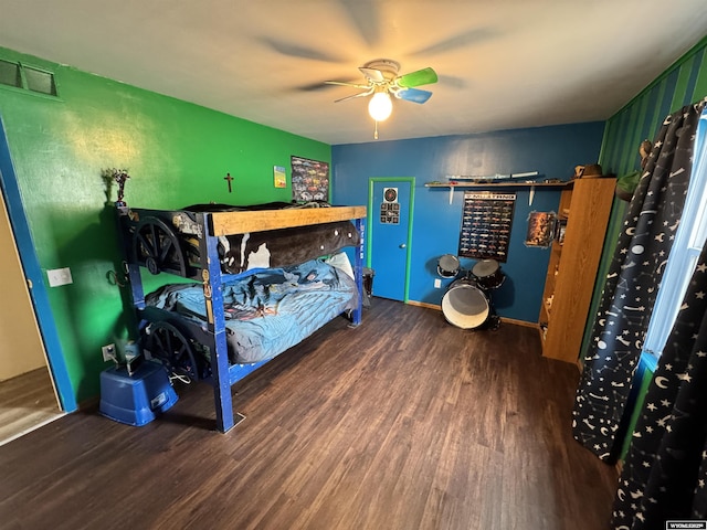 2842 Main St, Torrington, WY 82240 - bedroom with visible vents, wood finished floors, and ceiling fan
