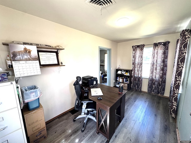 2842 Main St, Torrington, WY 82240 - office with visible vents, baseboards, and wood finished floors