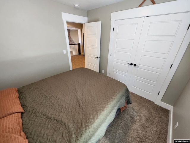 303 Tamarack Dr, Rock Springs, WY 82901 - carpeted bedroom featuring a closet