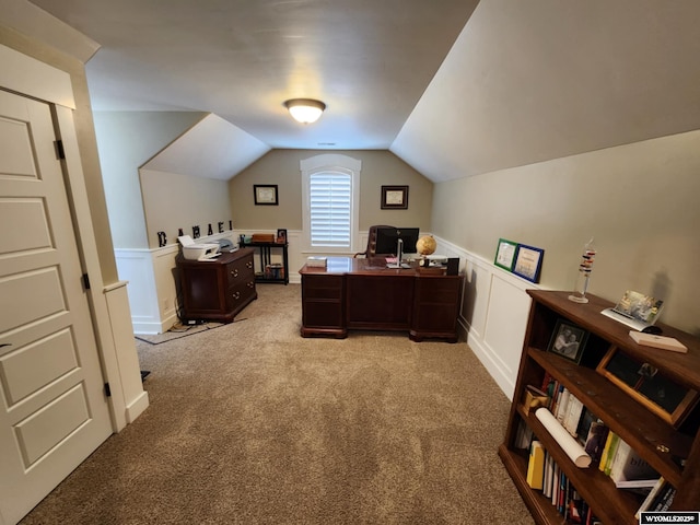 303 Tamarack Dr, Rock Springs, WY 82901 - office space with light carpet, vaulted ceiling, a decorative wall, and wainscoting