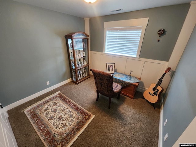 303 Tamarack Dr, Rock Springs, WY 82901 - office space with carpet flooring, visible vents, a decorative wall, and wainscoting