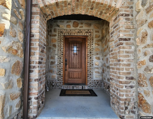 303 Tamarack Dr, Rock Springs, WY 82901 - view of exterior entry with stone siding and brick siding