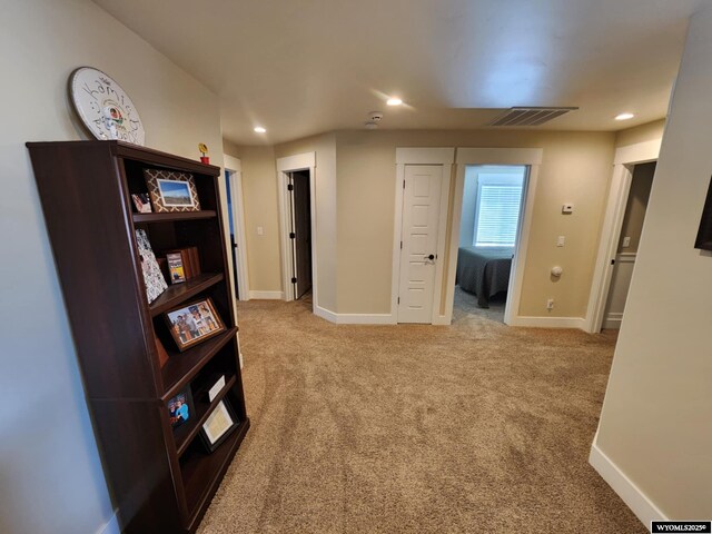 303 Tamarack Dr, Rock Springs, WY 82901 - hallway with baseboards, visible vents, recessed lighting, and carpet flooring