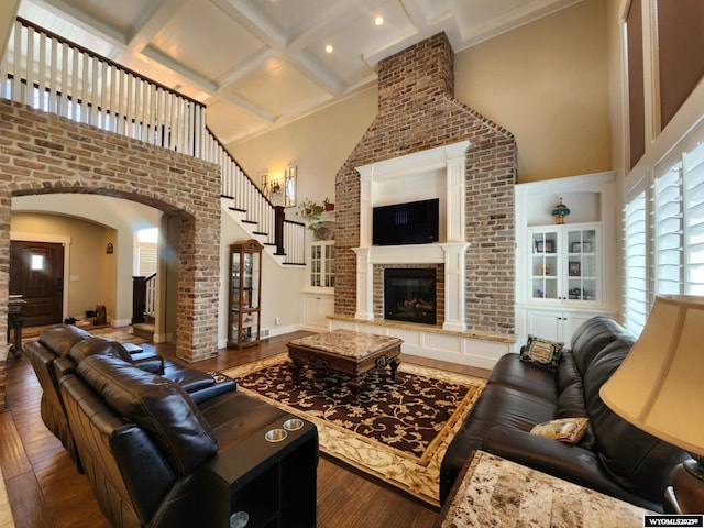 303 Tamarack Dr, Rock Springs, WY 82901 - living area with coffered ceiling, a towering ceiling, and hardwood / wood-style flooring