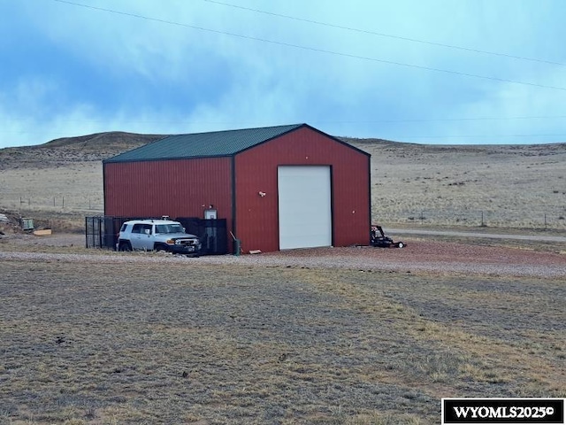37 Winchester Rd, Guernsey, WY 82214 - view of pole building with a mountain view