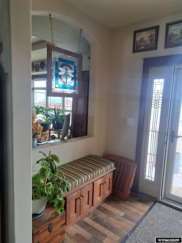 37 Winchester Rd, Guernsey, WY 82214 - interior space with arched walkways and wood finished floors
