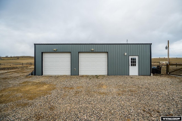 detached garage with fence